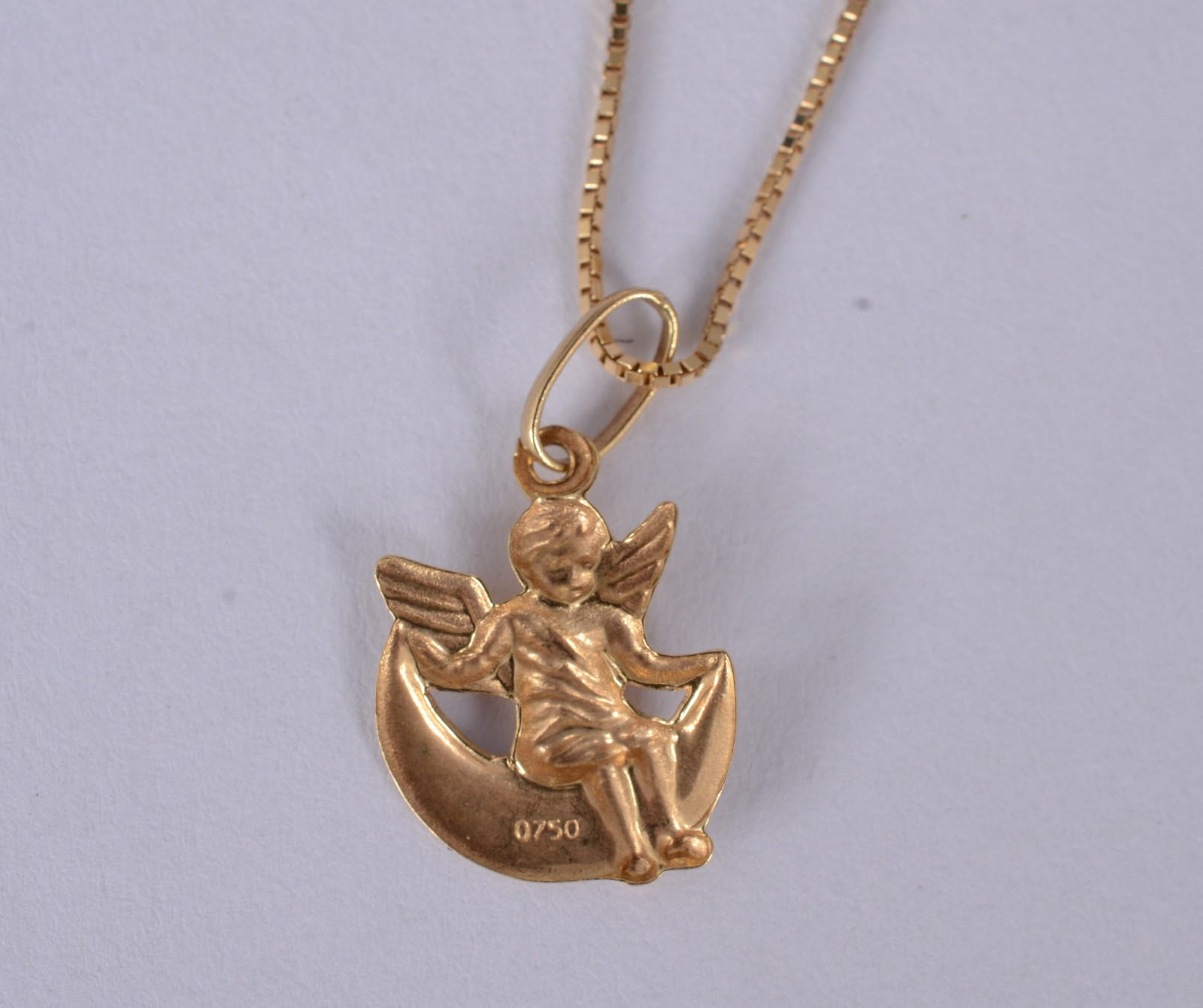 Colar de ouro amarelo 18 k., contraste 750mls e pingente... - foto 4 de 6