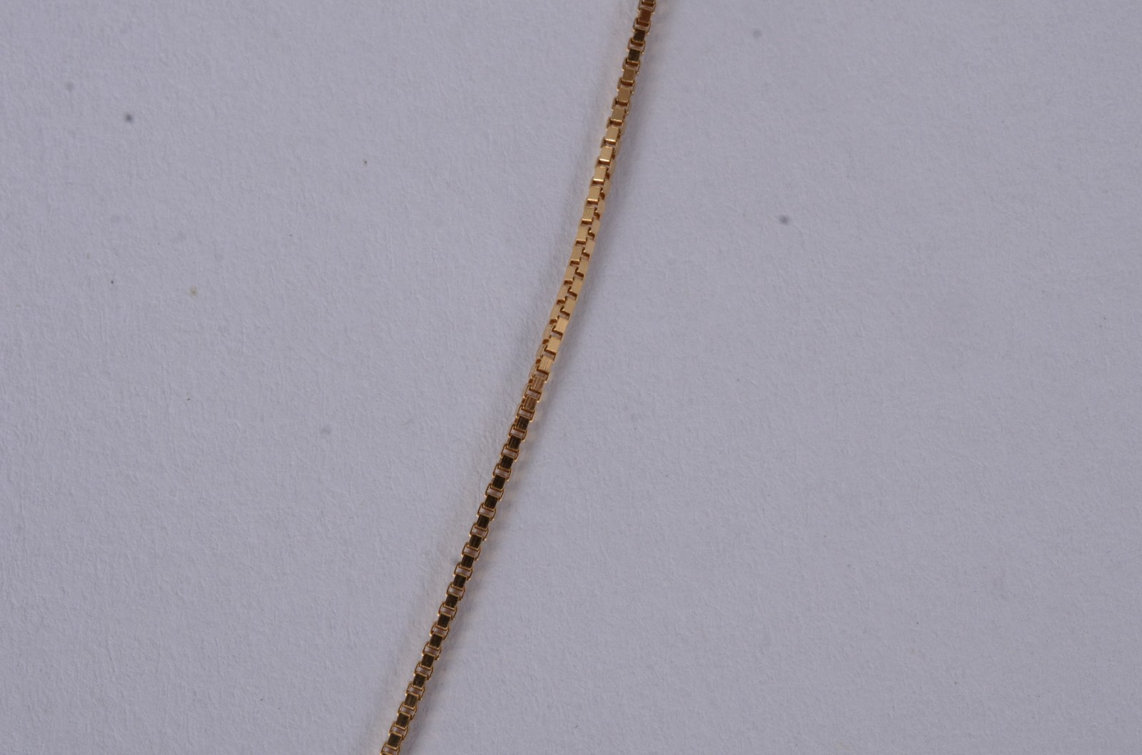 Colar de ouro amarelo 18 k., contraste 750mls e pingente... - foto 5 de 6