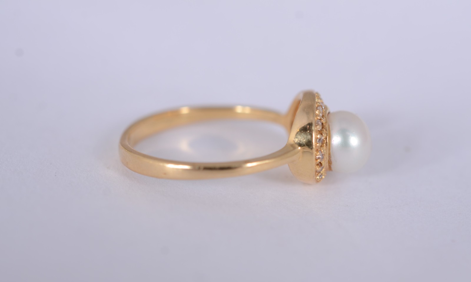 Anel de ouro amarelo 18 k., contraste 750mls com mini brilhantes e... - foto 4 de 7