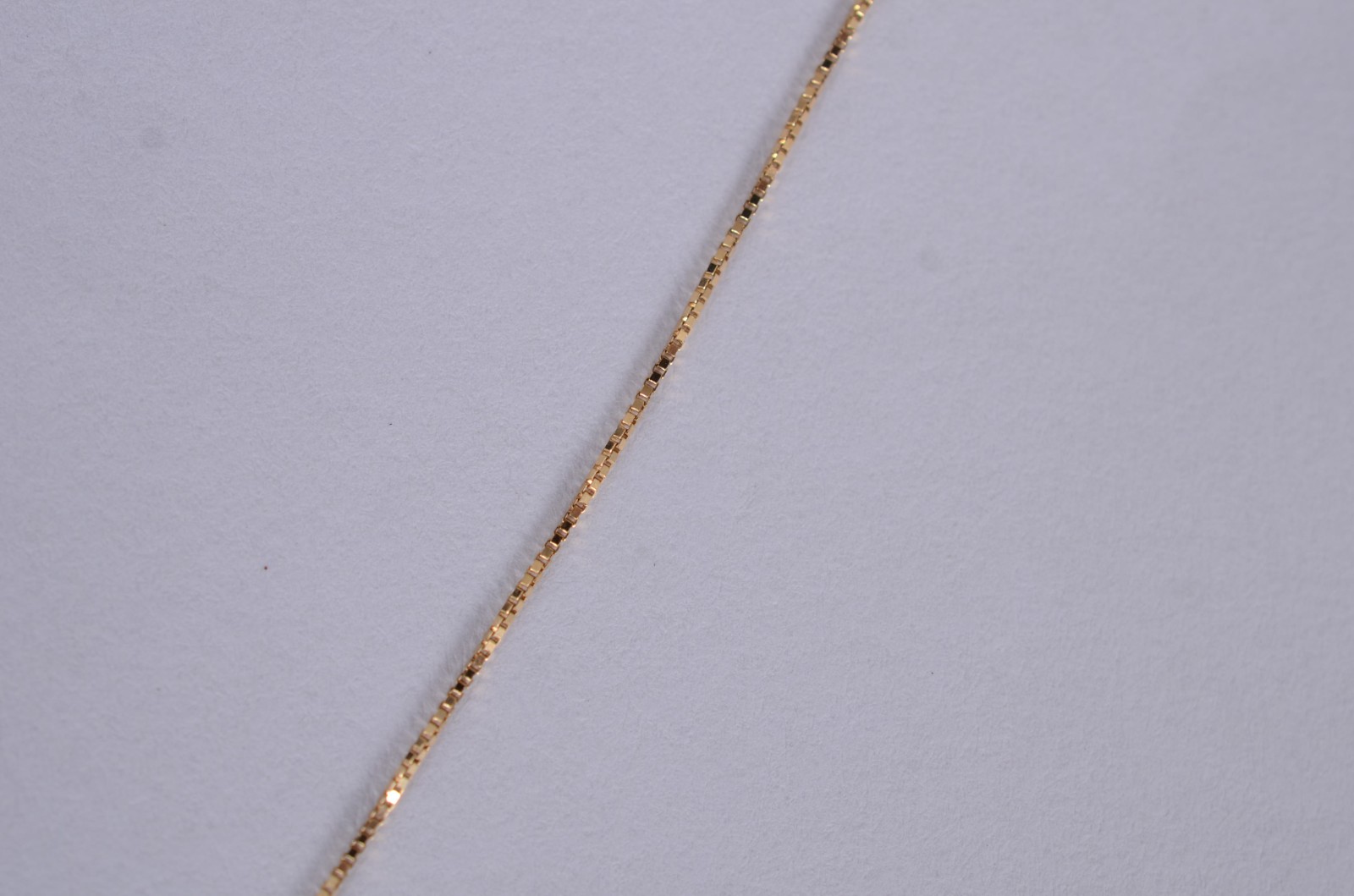 Colar de ouro amarelo 18k., contraste 750mls com pingente feitio sol... - foto 3 de 4