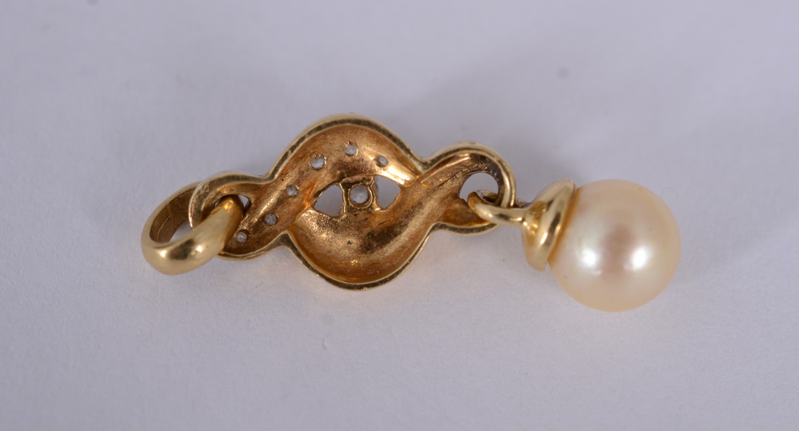 Pingente de ouro amarelo 18 k., contraste 750mls com brilhantes e... - foto 2 de 4