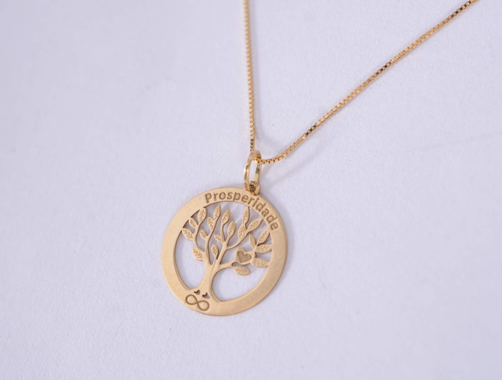 Colar de ouro 18 k., contraste 750 com pendente feitio árvore da... - foto 1 de 6