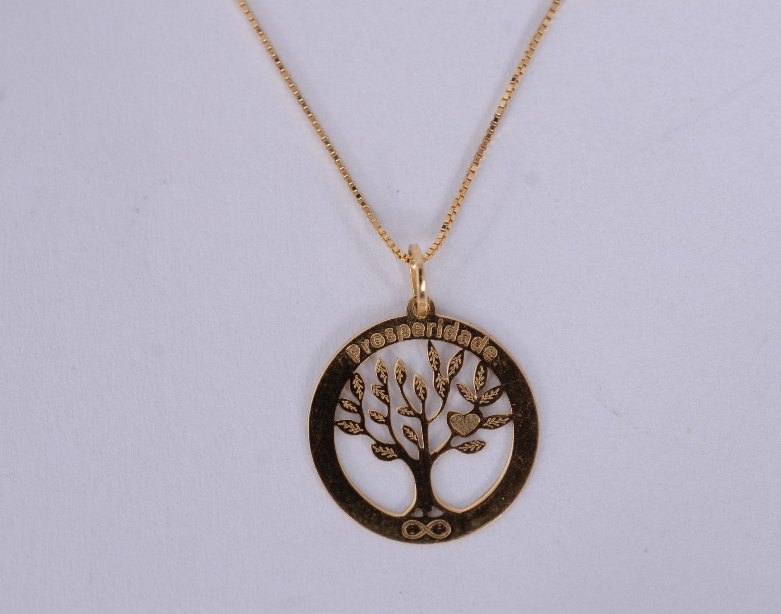 Colar de ouro 18 k., contraste 750 com pendente feitio árvore da... - foto 2 de 6