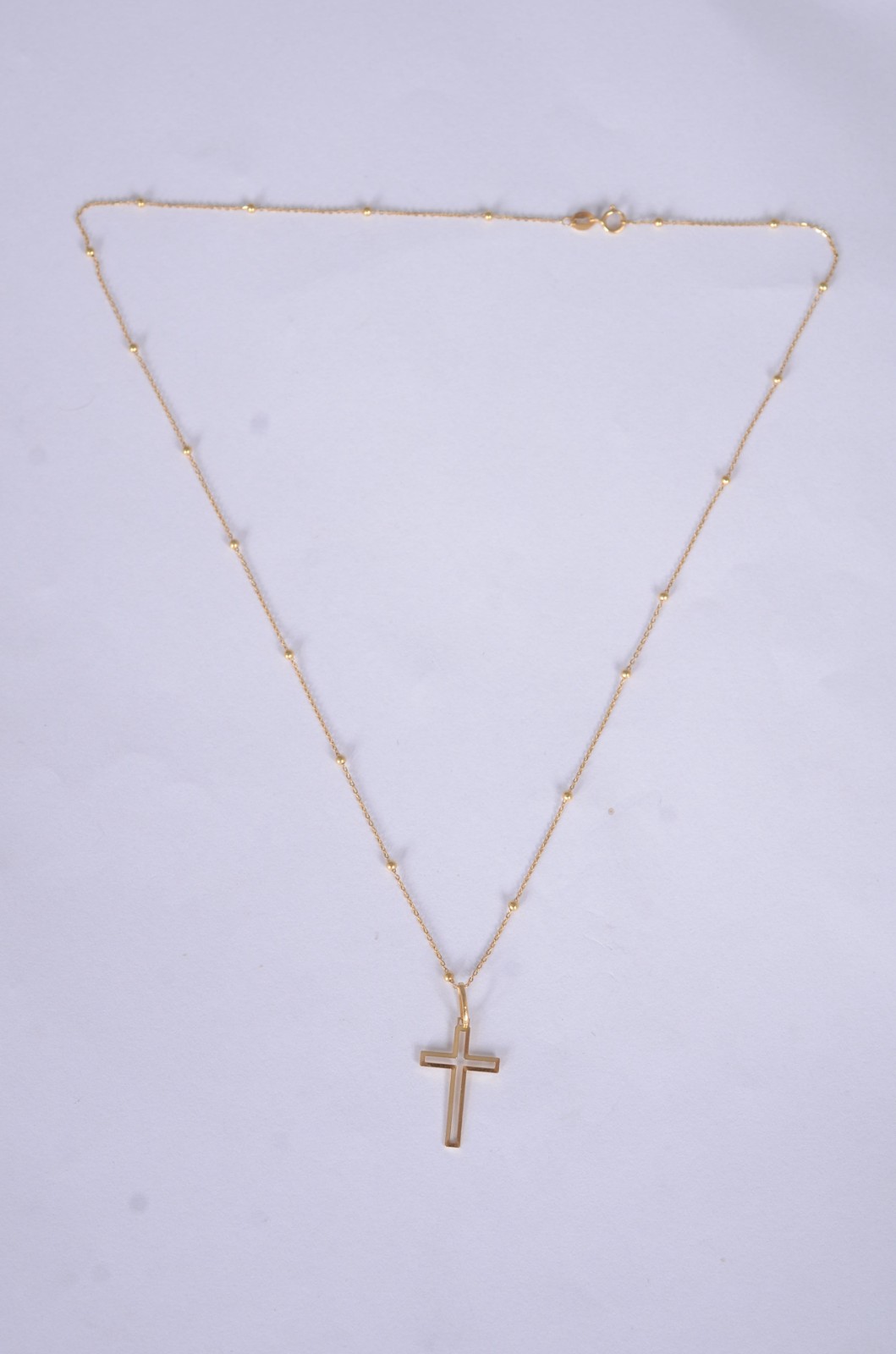 Colar de ouro amarelo 18k., contraste 750mls de bolinhas e crucifixo... - foto 3 de 5