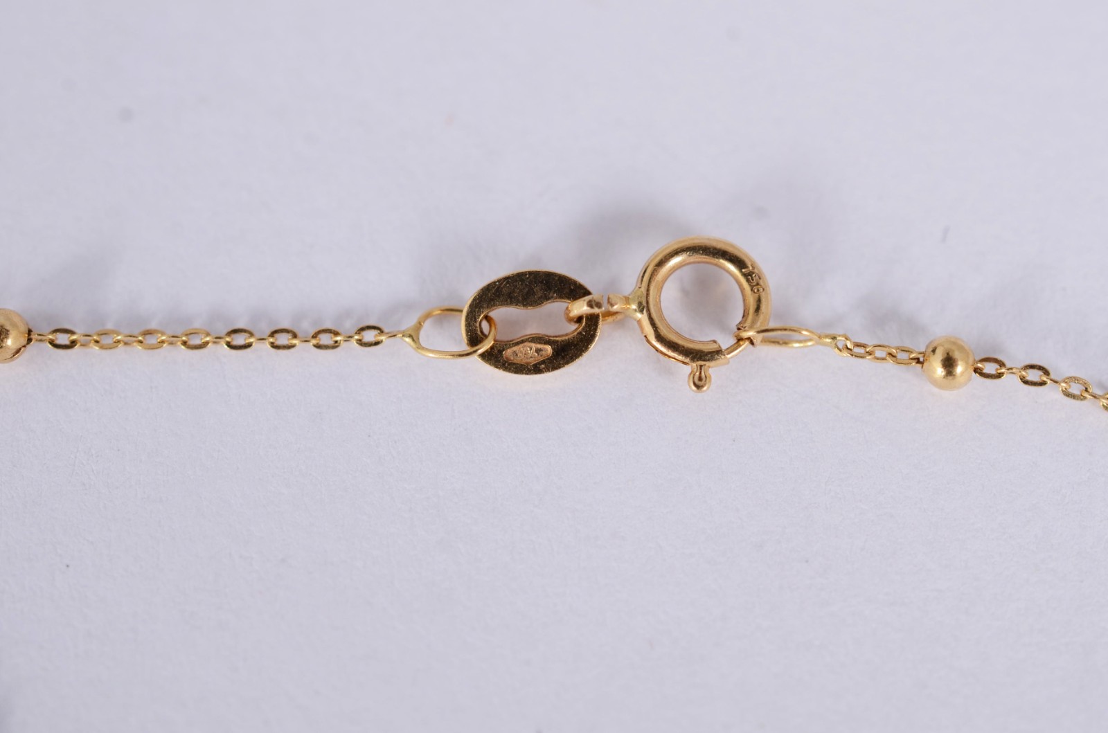 Colar de ouro amarelo 18k., contraste 750mls de bolinhas e crucifixo... - foto 5 de 5