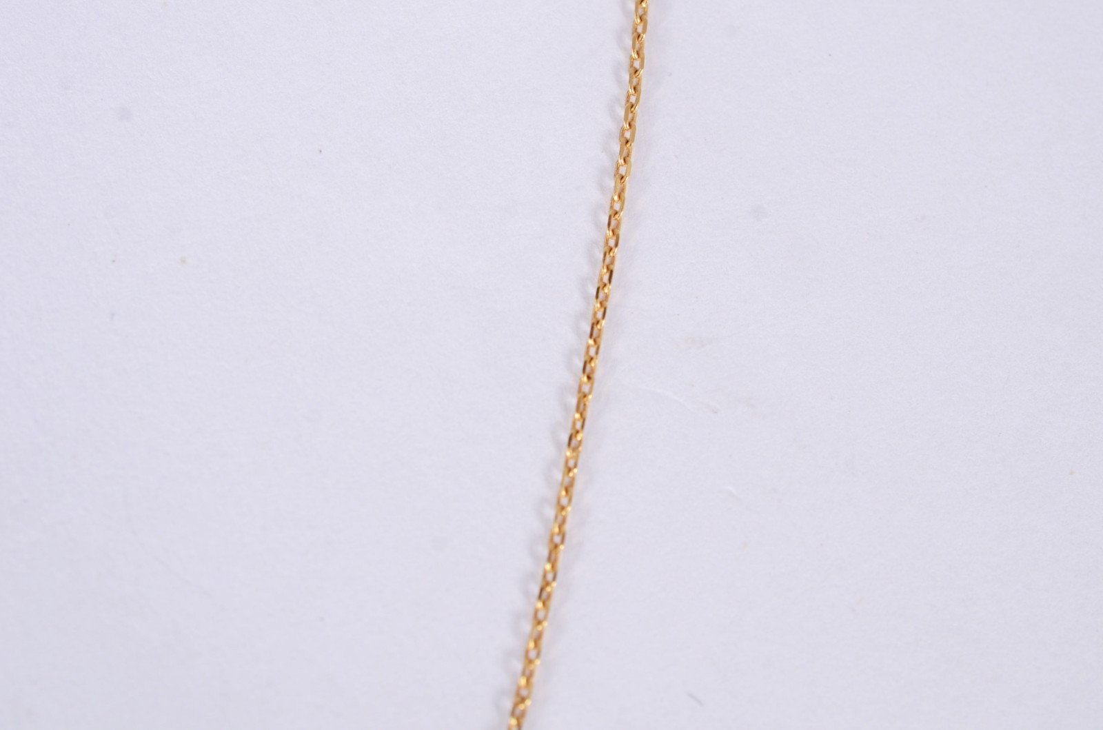 Colar de ouro amarelo 18 k., com pingente, safiras negras H gota... - foto 5 de 7