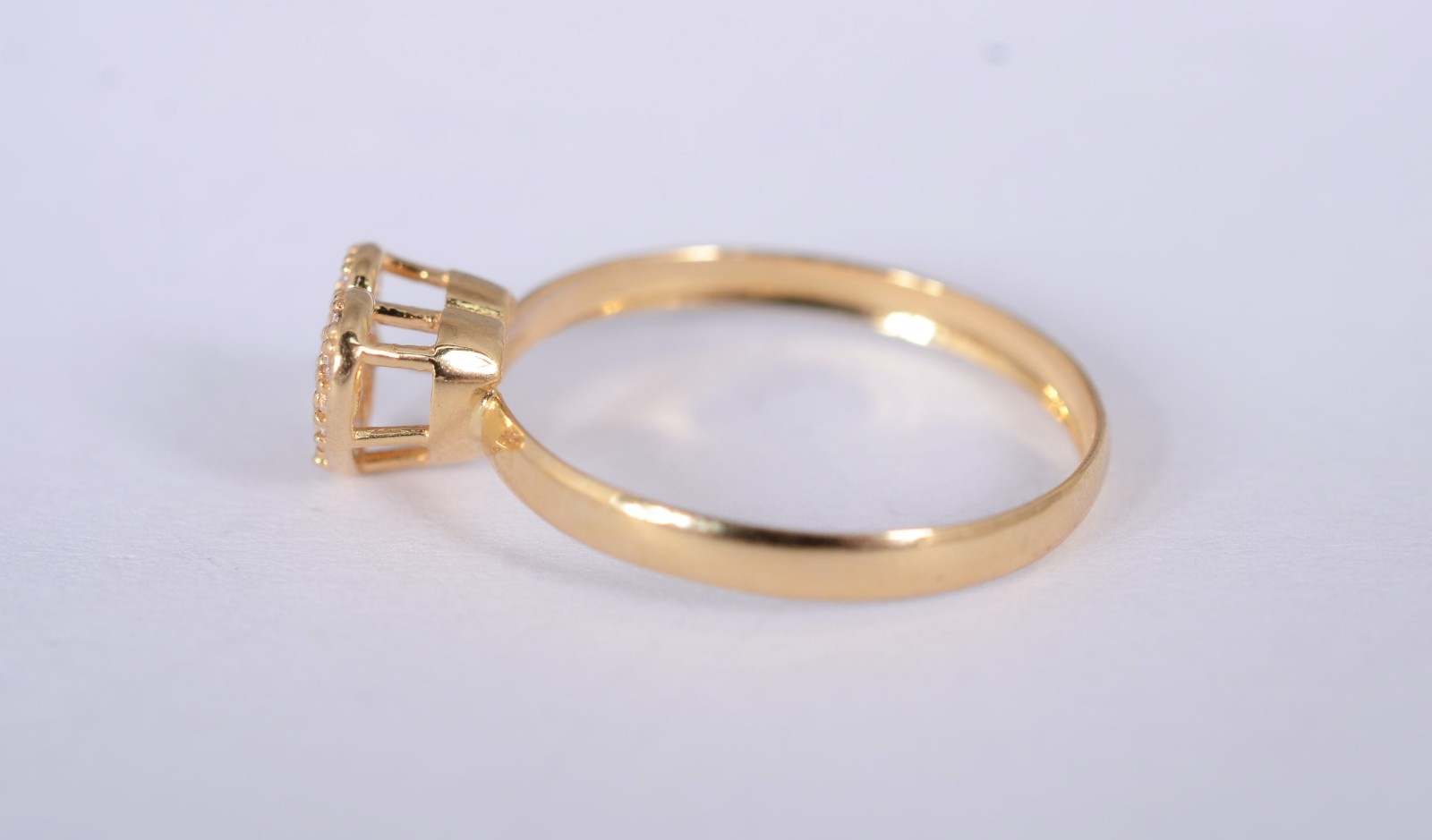 Anel de ouro amarelo 18 k., contraste 750mls, feitio coração com... - foto 3 de 8