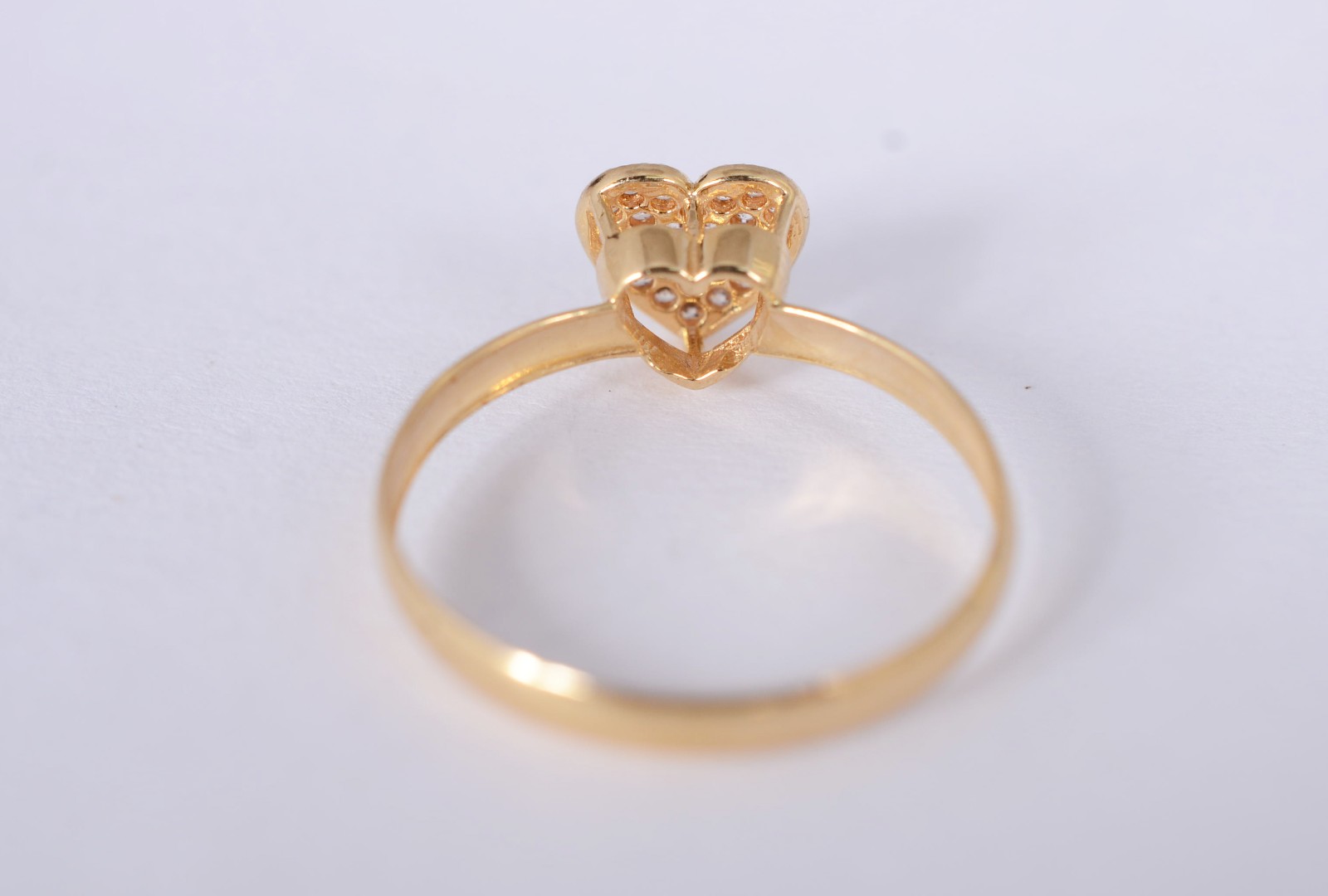 Anel de ouro amarelo 18 k., contraste 750mls, feitio coração com... - foto 4 de 8