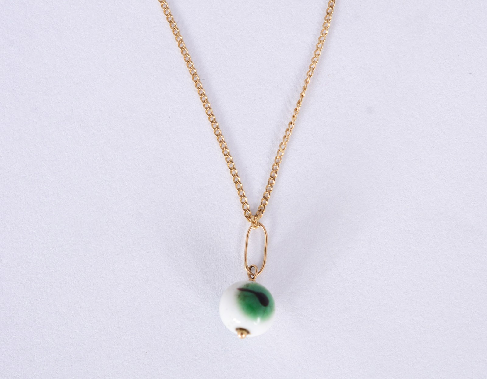 Colar de ouro 18 k,. com pendente feitio "olho mágico". (Por motivos... - foto 1 de 4