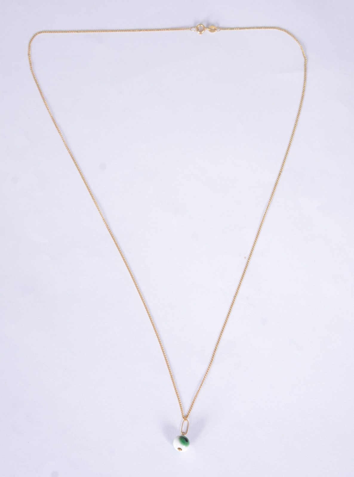 Colar de ouro 18 k,. com pendente feitio "olho mágico". (Por motivos... - foto 2 de 4