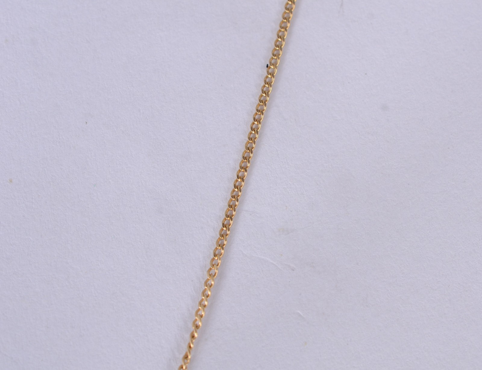 Colar de ouro 18 k,. com pendente feitio "olho mágico". (Por motivos... - foto 3 de 4