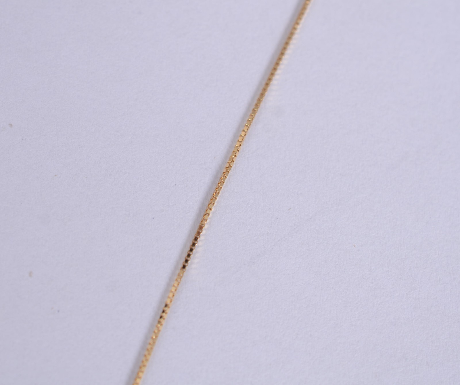 Colar de ouro 18 k., contraste 750 com pendente feitio estrela de... - foto 3 de 5