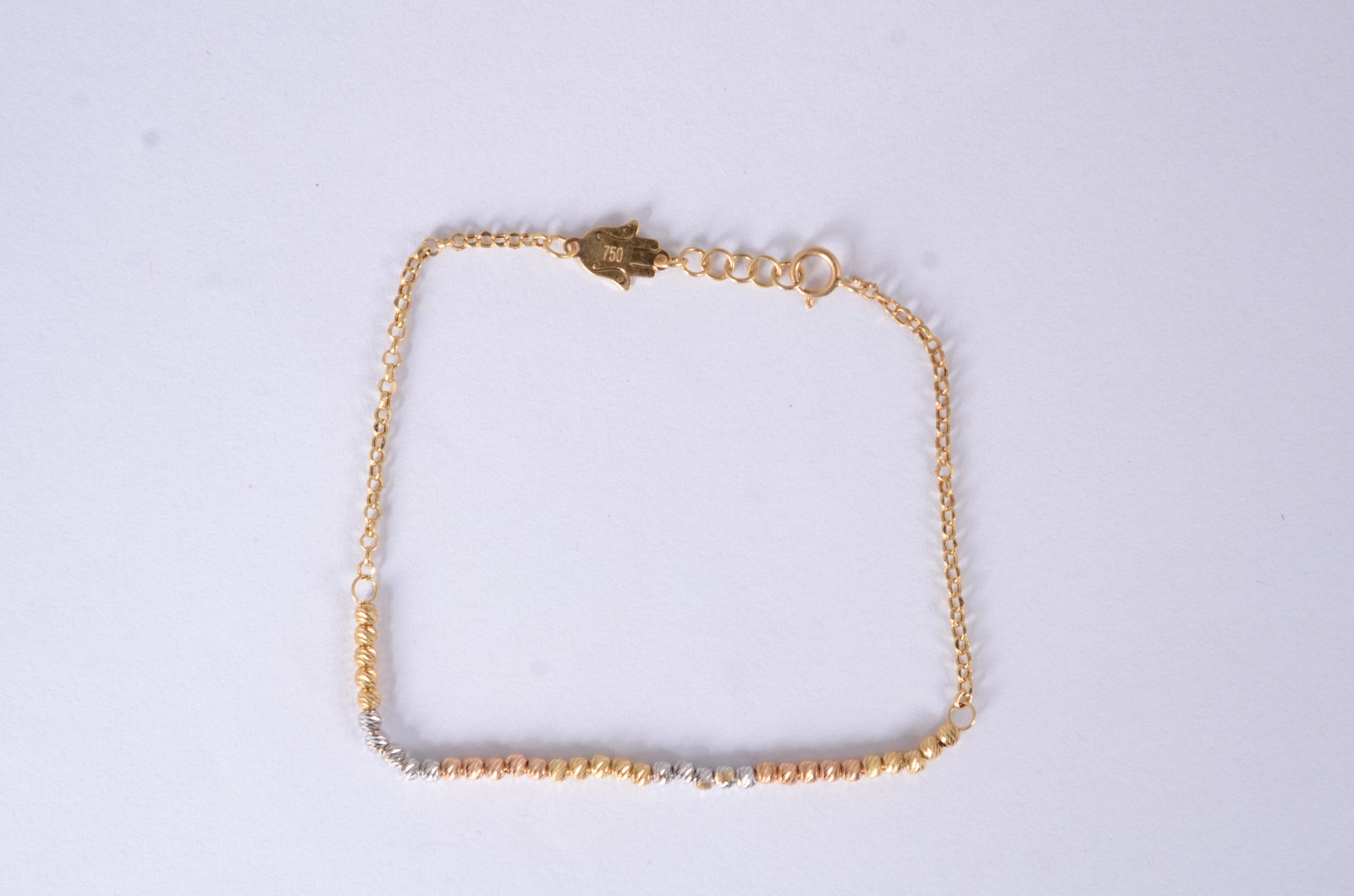 Pulseira em três tons de ouro, contraste 750. (Por motivos de... - foto 1 de 3