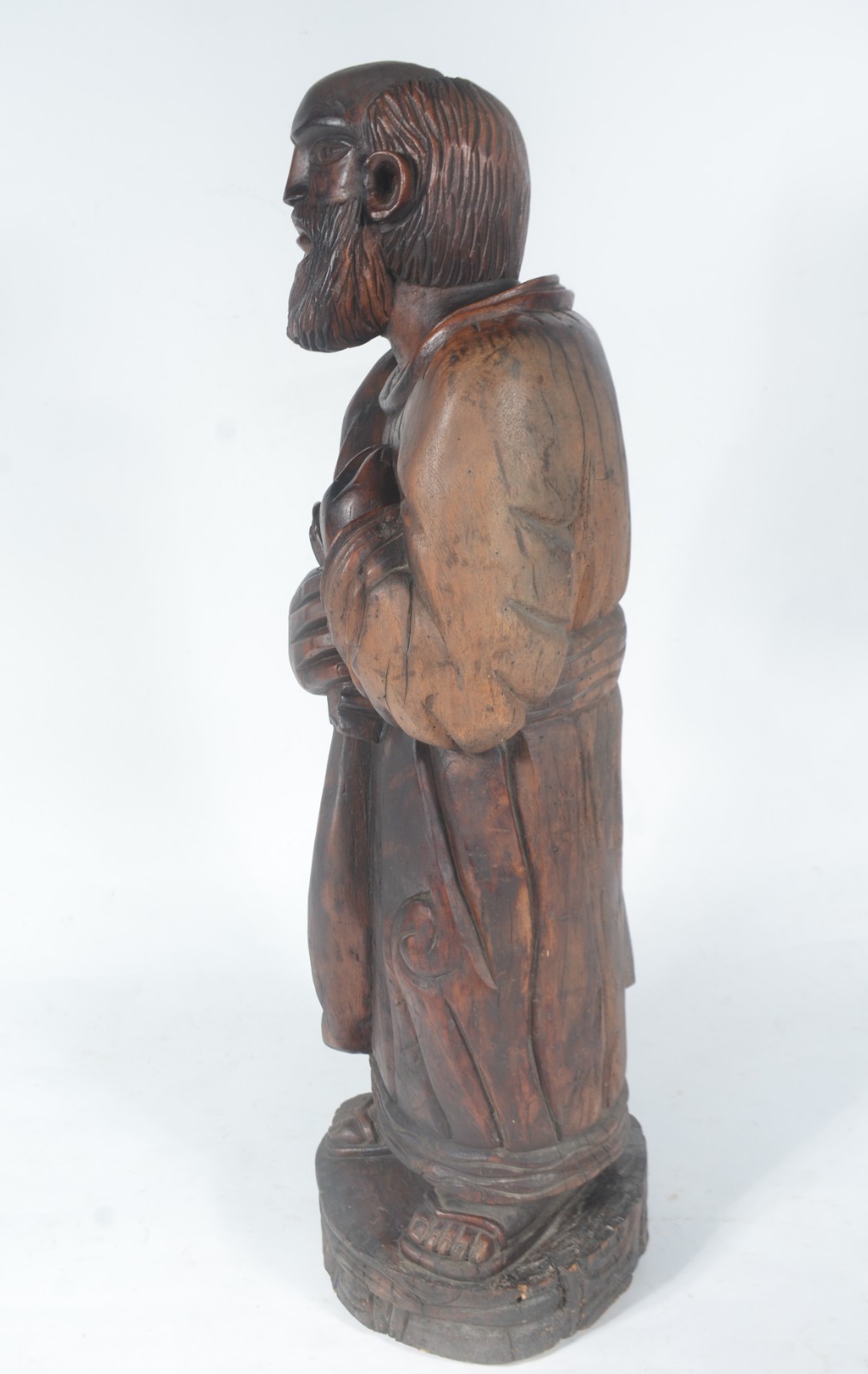 Grande escultura representando figura sacra de madeira entalhada... - foto 5 de 9