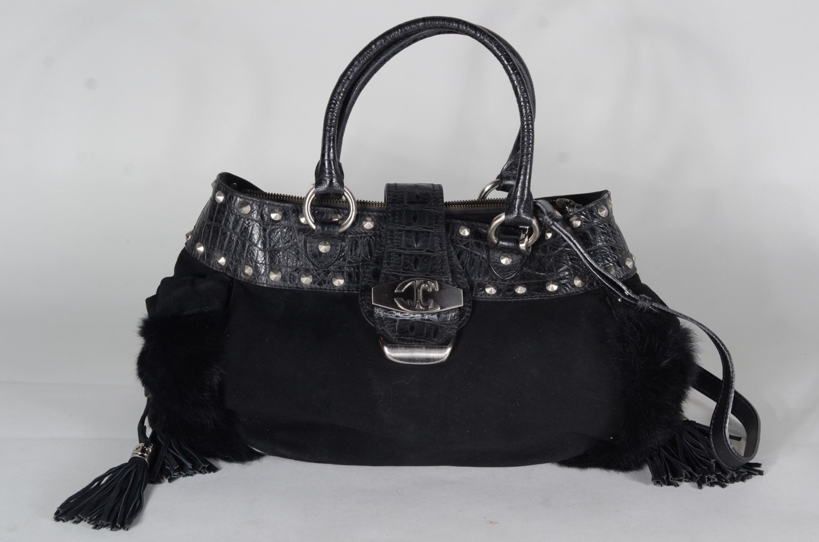 Bolsa feminina de couro e camurça preta, com alça para o ombro. - foto 1 de 10