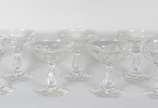 Baccarat (1764),  - Sete taças para champagne de cristal frances facetado, bases sextavadas.