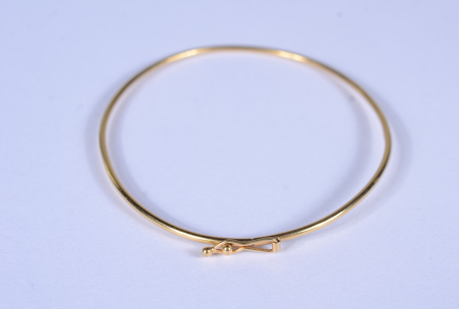 Pulseira de ouro 18 k., contraste 750, modelo escrava. (Por motivos... - foto 1 de 3