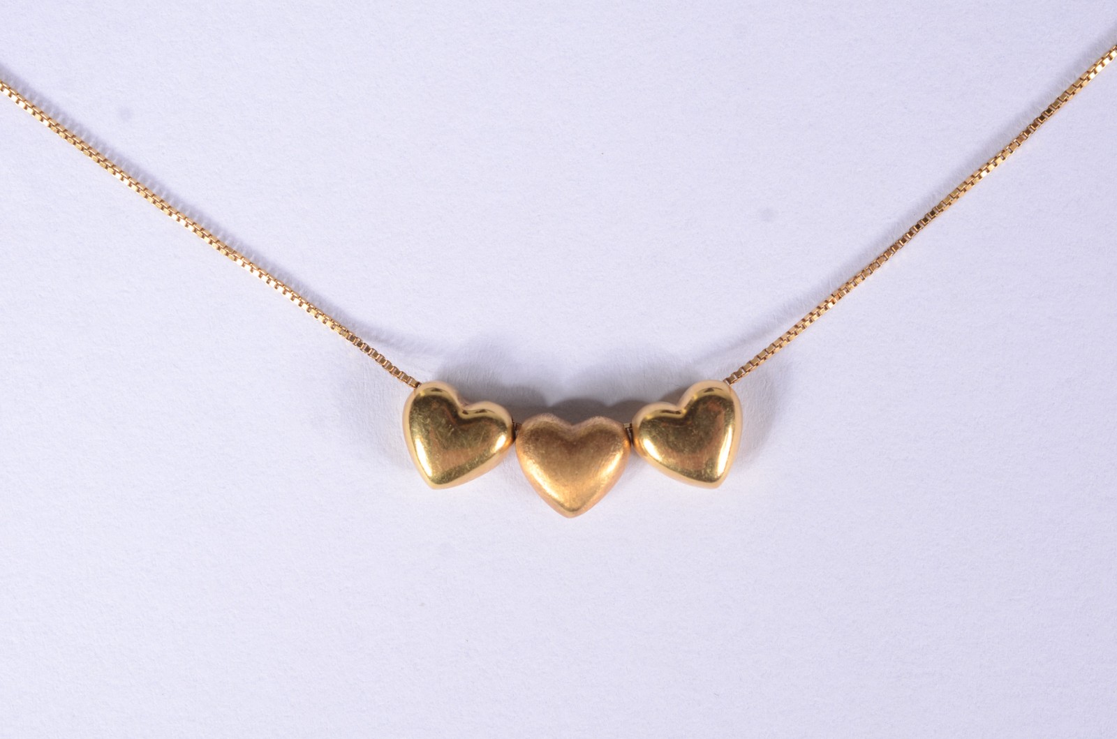Colar de ouro 18 k., contraste 750 feitio coração. (Por motivos de... - foto 1 de 4