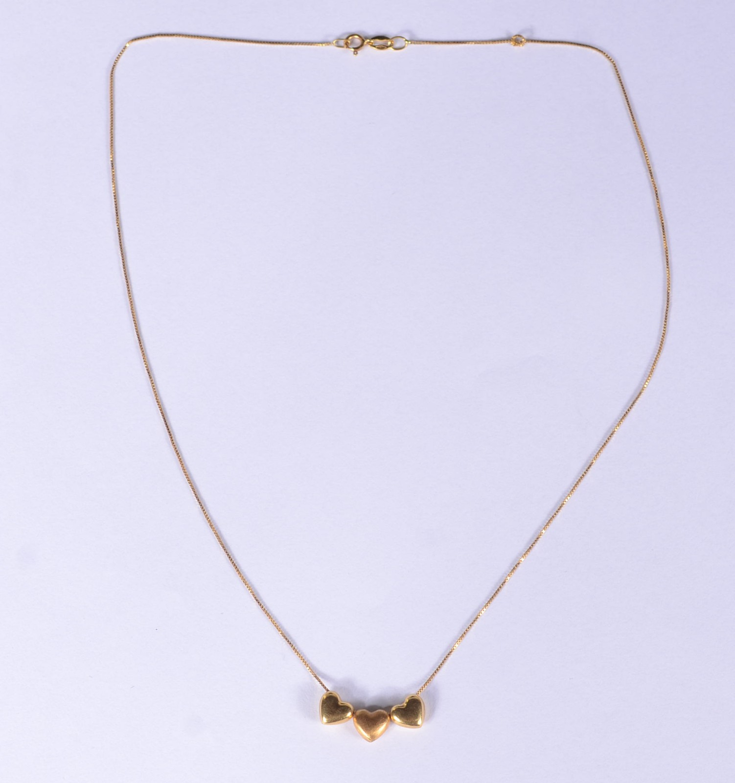 Colar de ouro 18 k., contraste 750 feitio coração. (Por motivos de... - foto 2 de 4