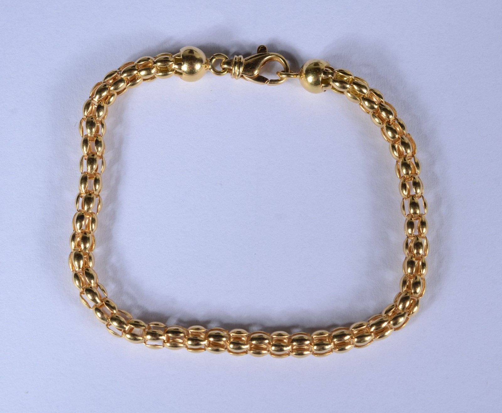 Pulseira de ouro 18 k., feitio elos portugueses. (Por motivos de... - foto 1 de 6