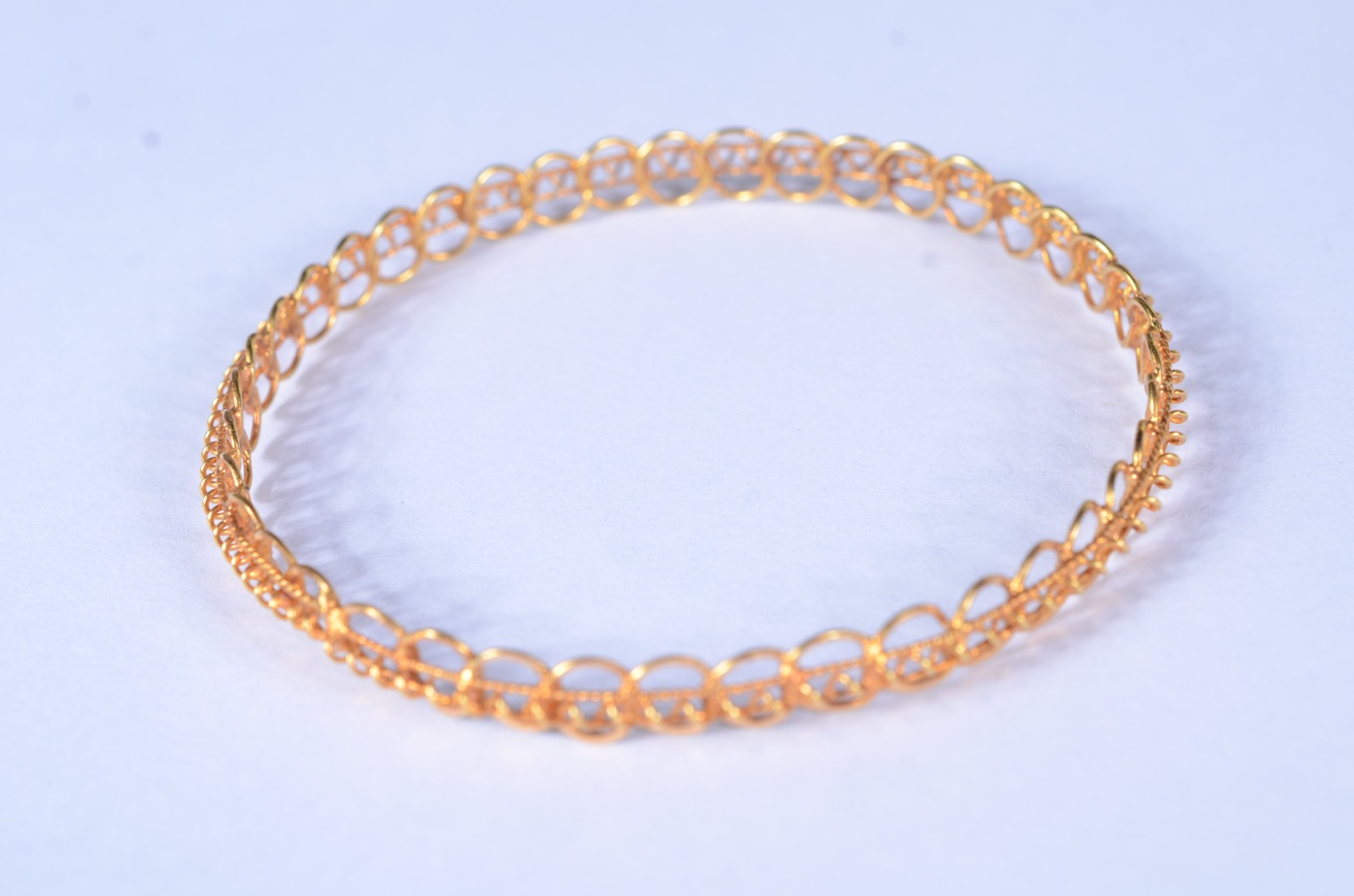 Pulseira escrava de ouro 18 k. (Por motivos de segurança a peça não... - foto 3 de 5