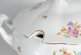 Sopeira de porcelana Polonesa decorada com flor... - Sopeira de porcelana Polonesa decorada com flores em policromia.