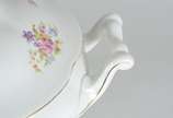 Sopeira de porcelana Polonesa decorada com flor... - Sopeira de porcelana Polonesa decorada com flores em policromia.