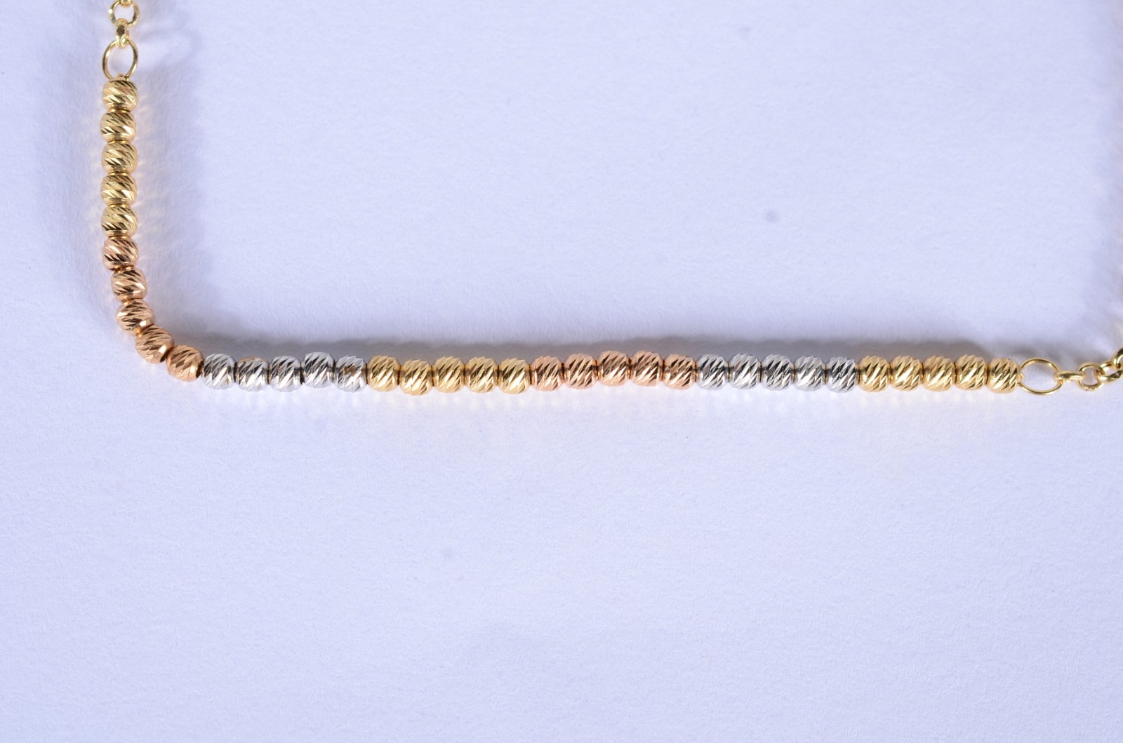 Pulseira em três tons de ouro, contraste 750 mls. (Por motivos de... - foto 8 de 8