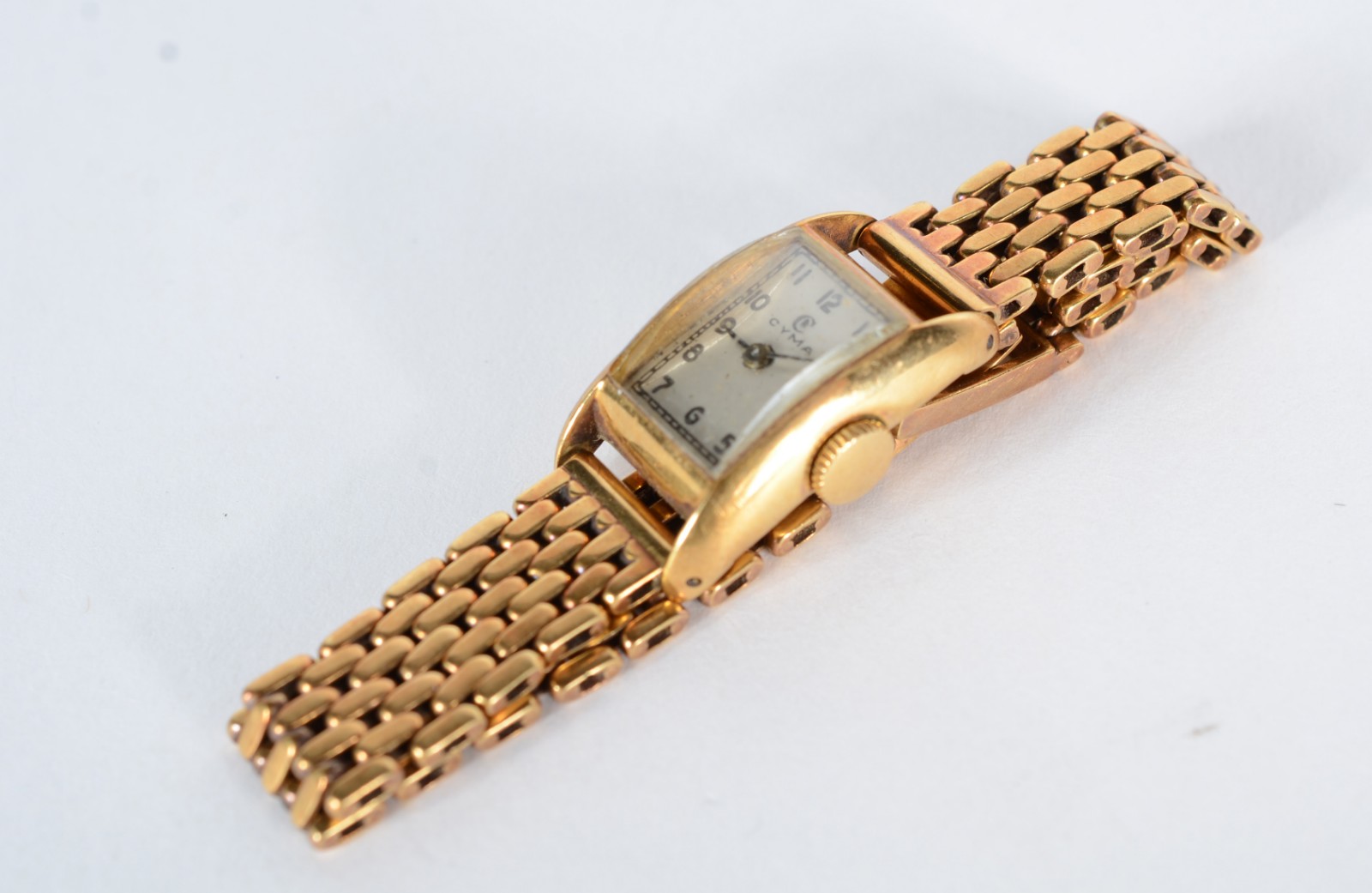 Relógio de pulso com caixa e pulseira de ouro 18 k., marca Cyma. - foto 1 de 7