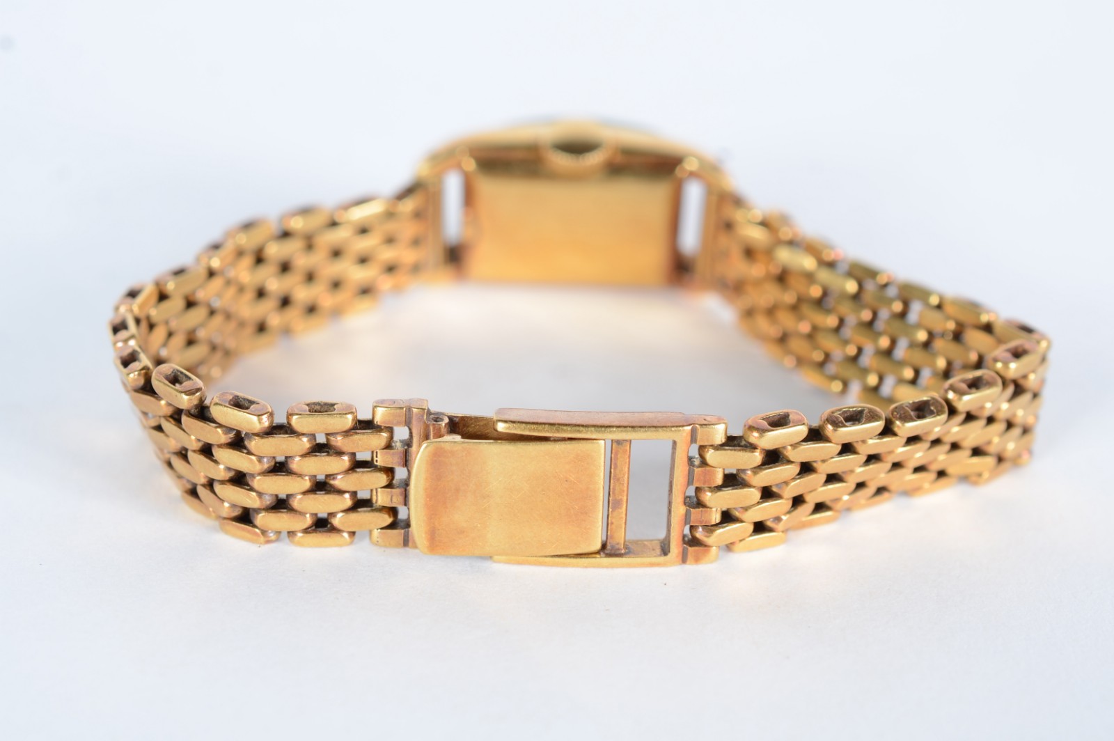 Relógio de pulso com caixa e pulseira de ouro 18 k., marca Cyma. - foto 6 de 7