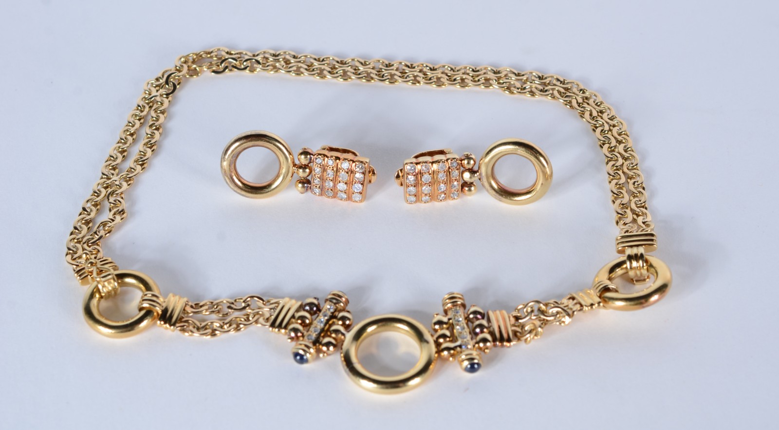 Conjunto de ouro 18 k composto de par de brincos e colar com duas... - foto 1 de 11