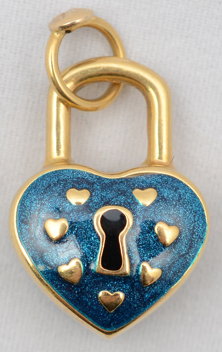 Pendente "cadeado" em ouro 18 k, contrastes e marcas da...