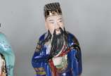 Três esculturas de porcelana policromada repres... - Três esculturas de porcelana policromada representando figuras típicas.