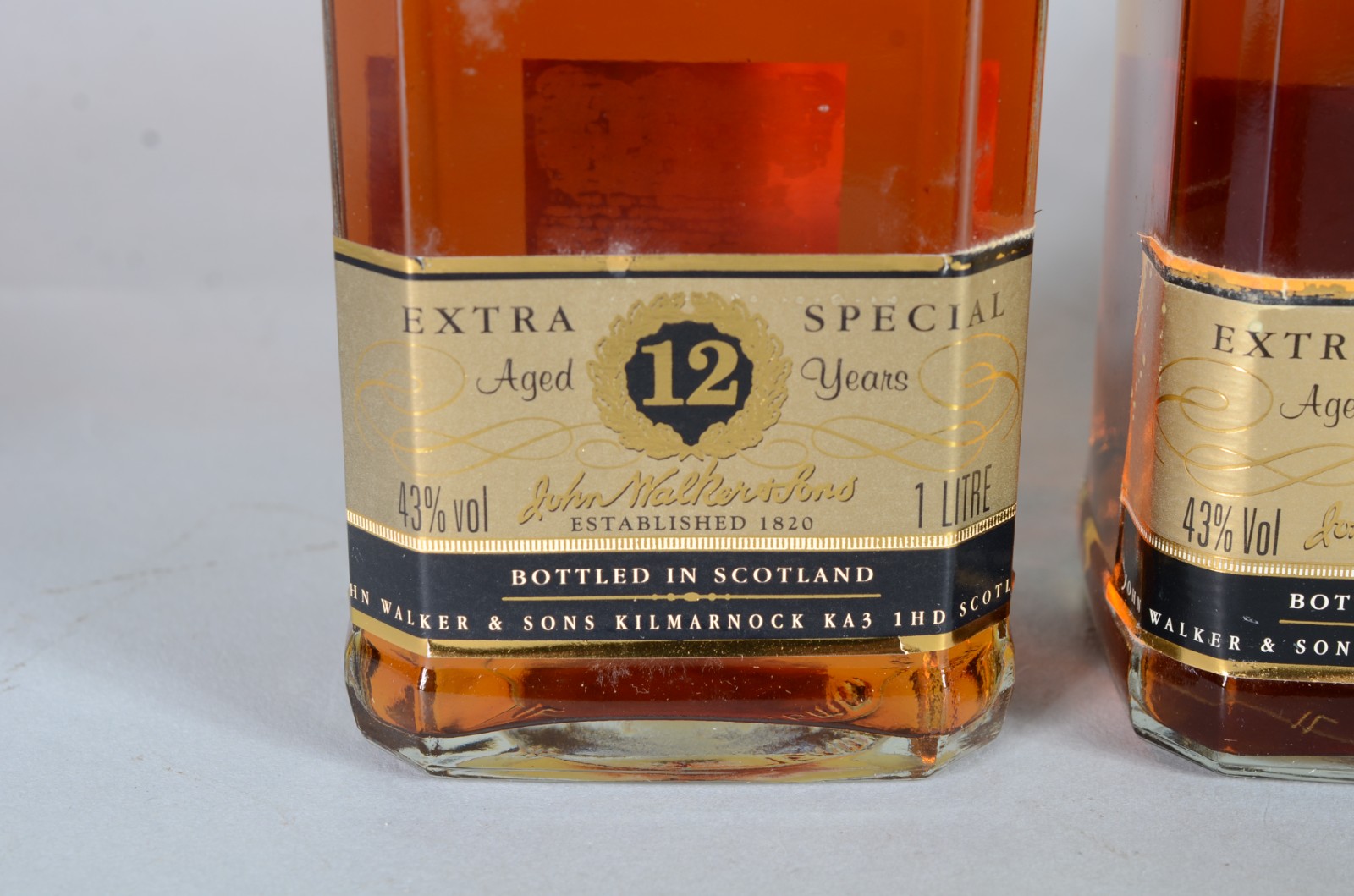 Quatro garrafas de bebida, sendo: 2 whisky Jwalker 12 anos; whisky... - foto 8 de 11