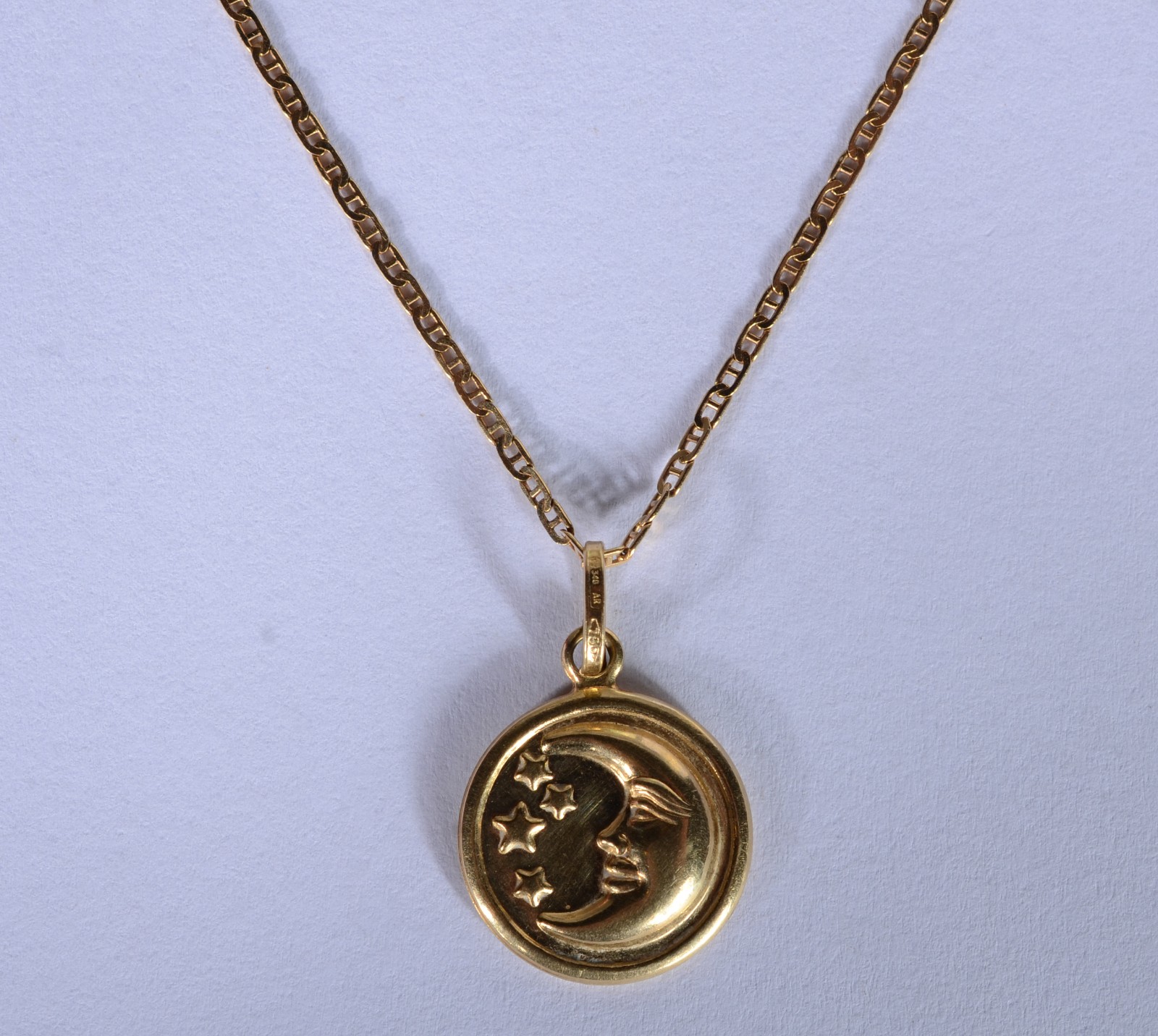 Colar de ouro 18 k., contraste 750 mls com pendente feitio lua e... - foto 1 de 6