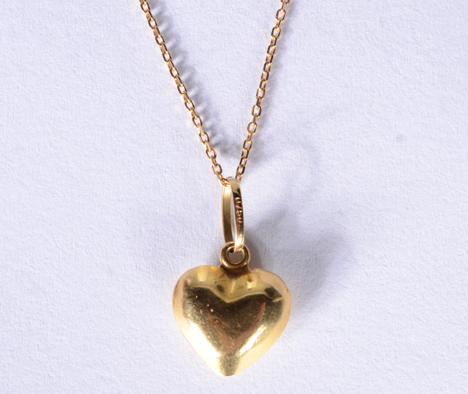 Colar de ouro 18 k., contraste 750 mls com pendente feitio coração... - foto 6 de 7