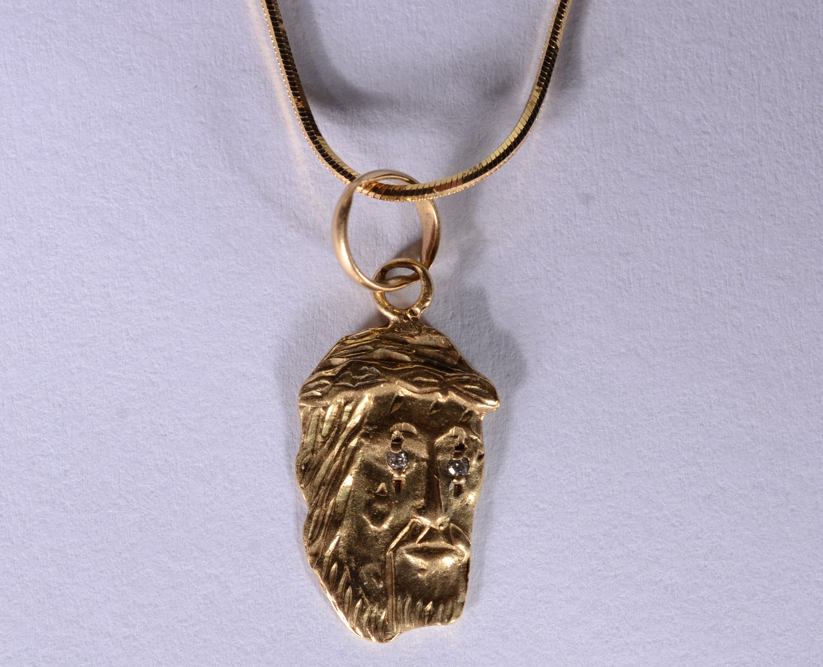 Colar de ouro 18 k., contraste 750 mls feitio "rabo de rato" com... - foto 1 de 5