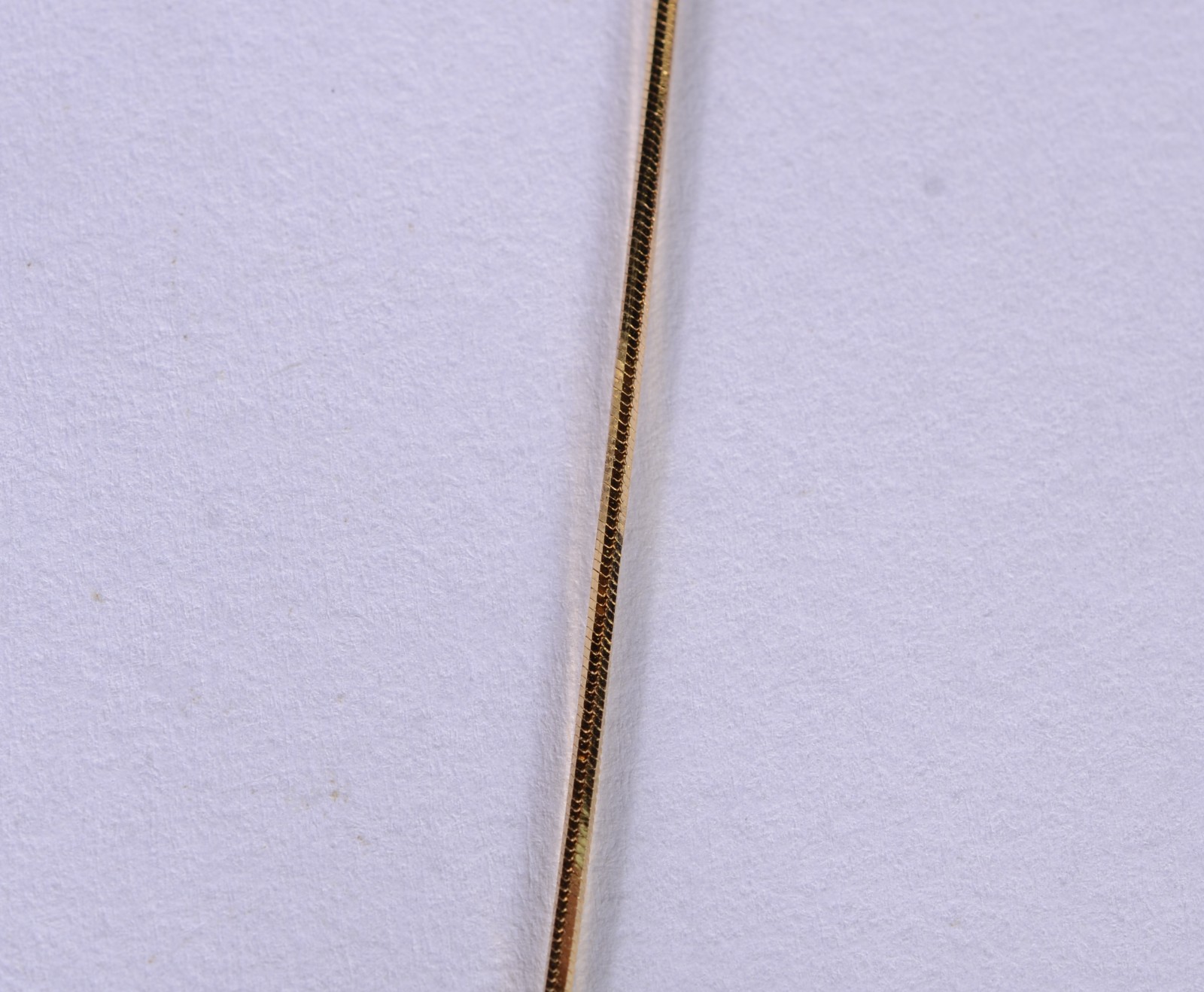Colar de ouro 18 k., contraste 750 mls feitio "rabo de rato" com... - foto 3 de 5