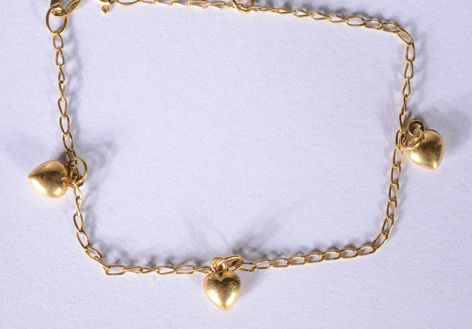 Pulseira de ouro 18 k. com corações. (Por motivos de segurança a peça... - foto 3 de 4