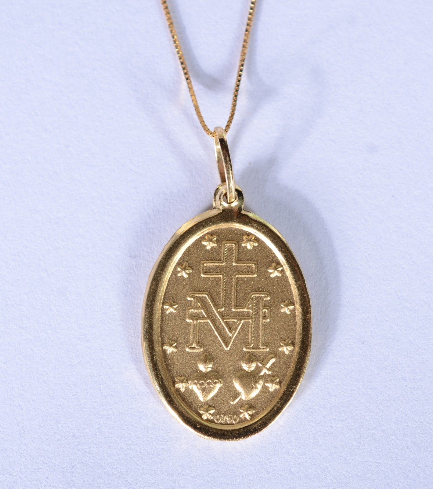 Colar de ouro 18 k., contraste 750 mls com pendente sacro descrito... - foto 1 de 4