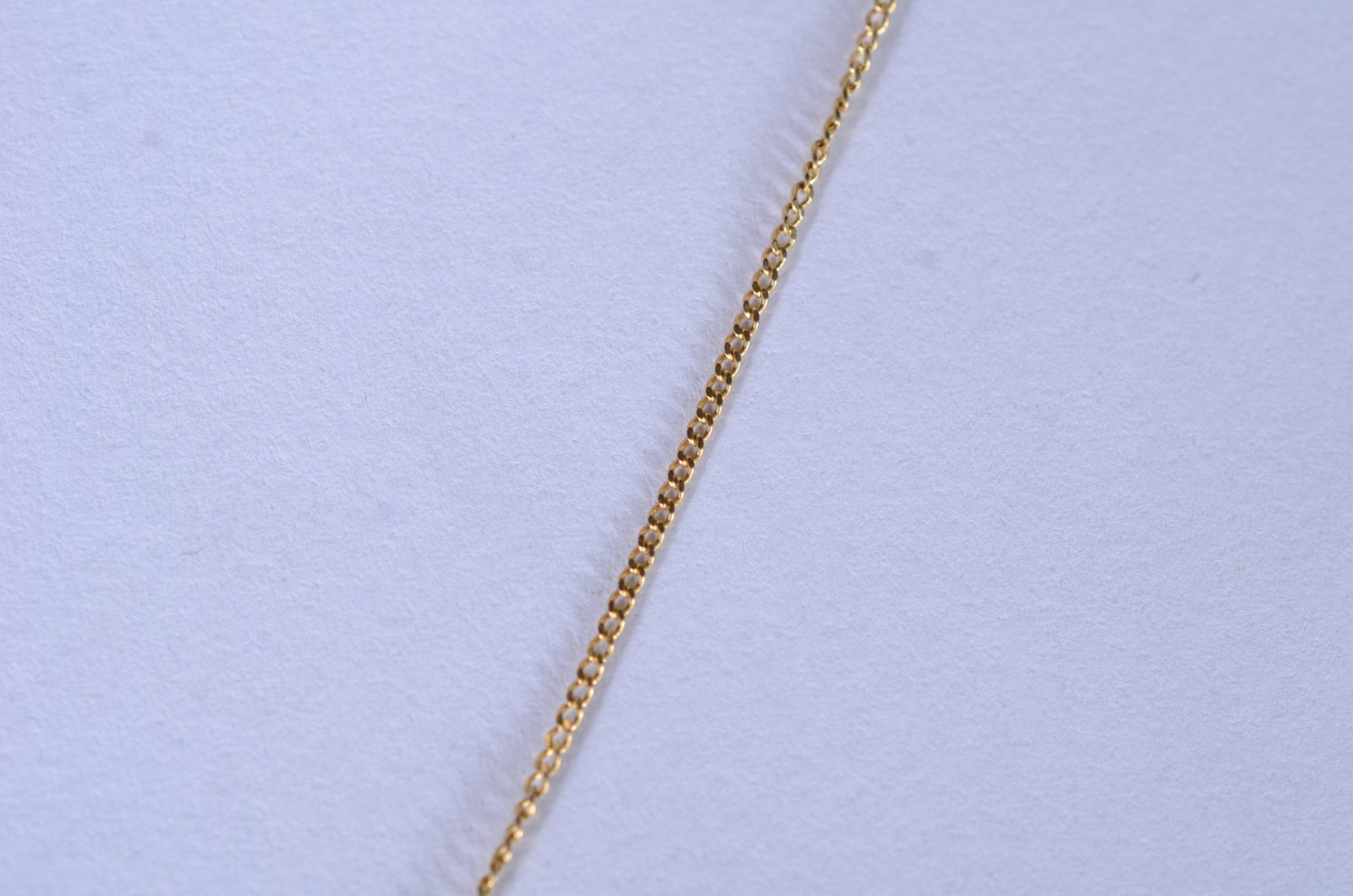 Colar de ouro 18 k., contraste 750 mls com pendente "olho mágico"... - foto 3 de 4