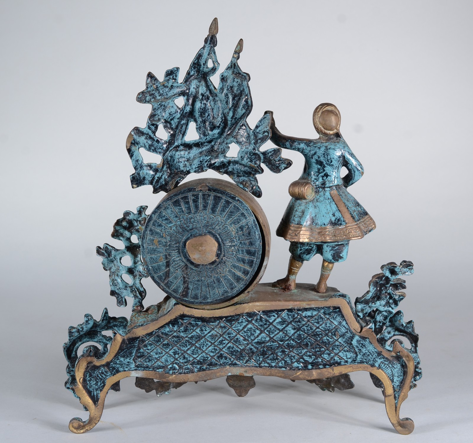 Relógio decorativo de mesa em metal dourado patinado com figura de... - foto 9 de 11