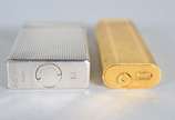 Dois isqueiros, sendo: Cartier em Plaque D'or e... - Dois isqueiros, sendo: Cartier em Plaque D'or e Dupont.