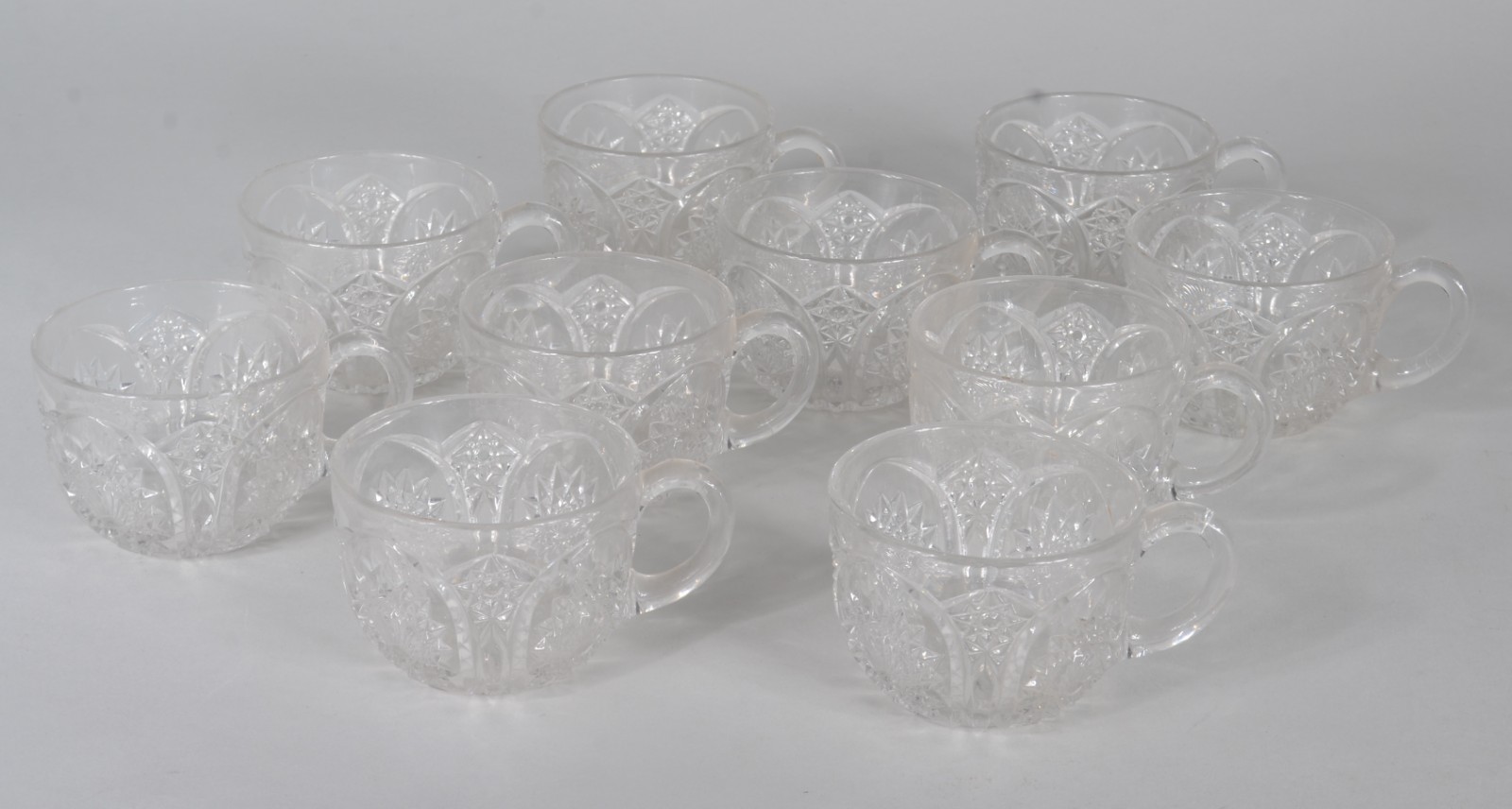Poncheira de cristal lapidado, borda dentada com 10 canecas... - foto 2 de 10