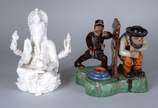 Duas peças, sendo: grupo escultórico de faiança... - Duas peças, sendo: grupo escultórico de faiança portuguesa policromada Caldas da Rainha e estatueta Blanc de Chine representando "Divindade Indi...