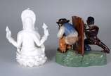 Duas peças, sendo: grupo escultórico de faiança... - Duas peças, sendo: grupo escultórico de faiança portuguesa policromada Caldas da Rainha e estatueta Blanc de Chine representando "Divindade Indi...