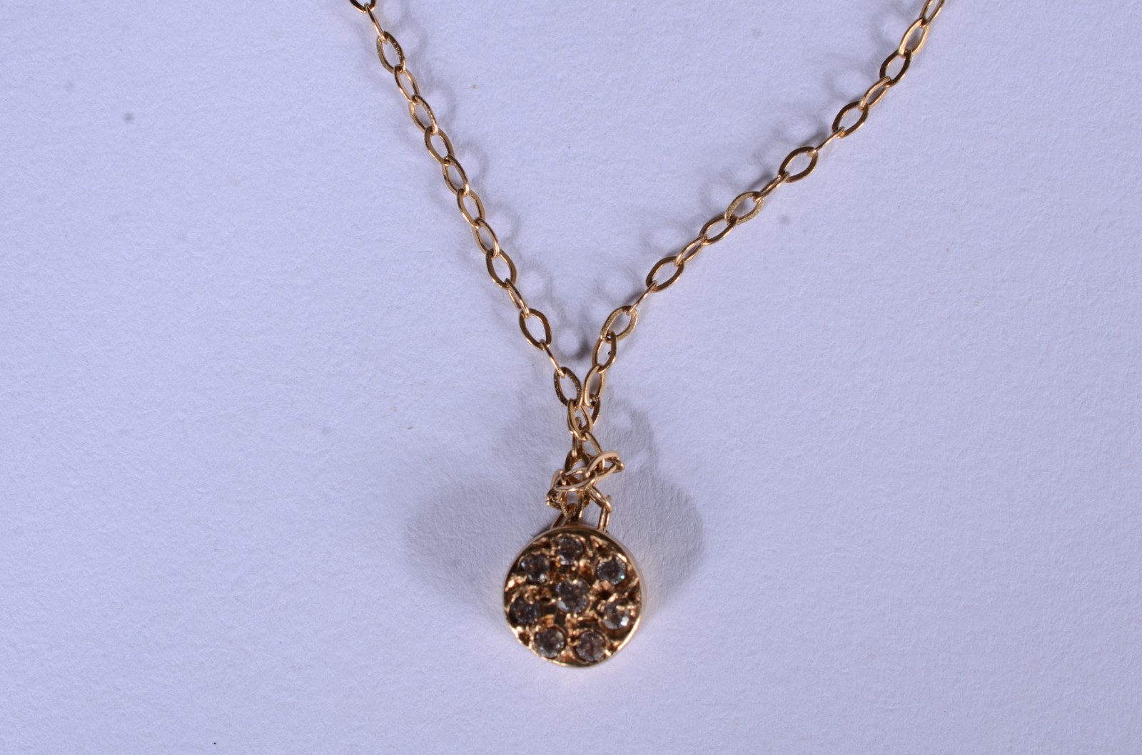 Colar de ouro 18 k., contraste 750 com pendente "ponto de luz"... - foto 1 de 8