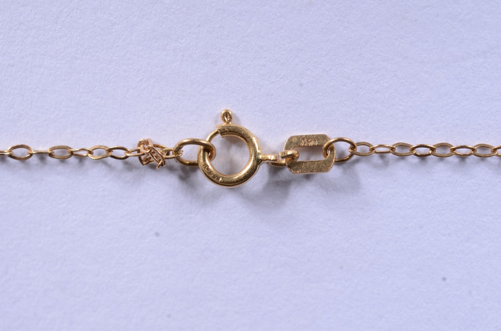 Colar de ouro 18 k., contraste 750 com pendente "ponto de luz"... - foto 6 de 8