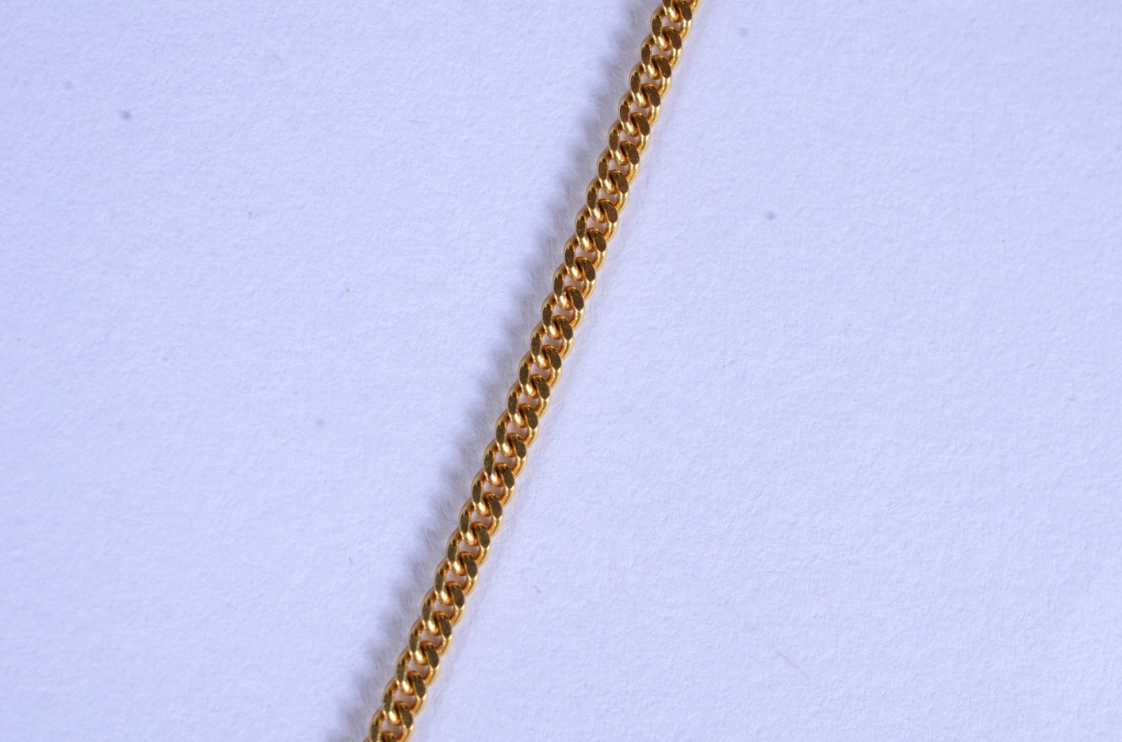 Colar de ouro 18 k., contraste 750 feitio Grumet com crucifixo. (Por... - foto 8 de 9