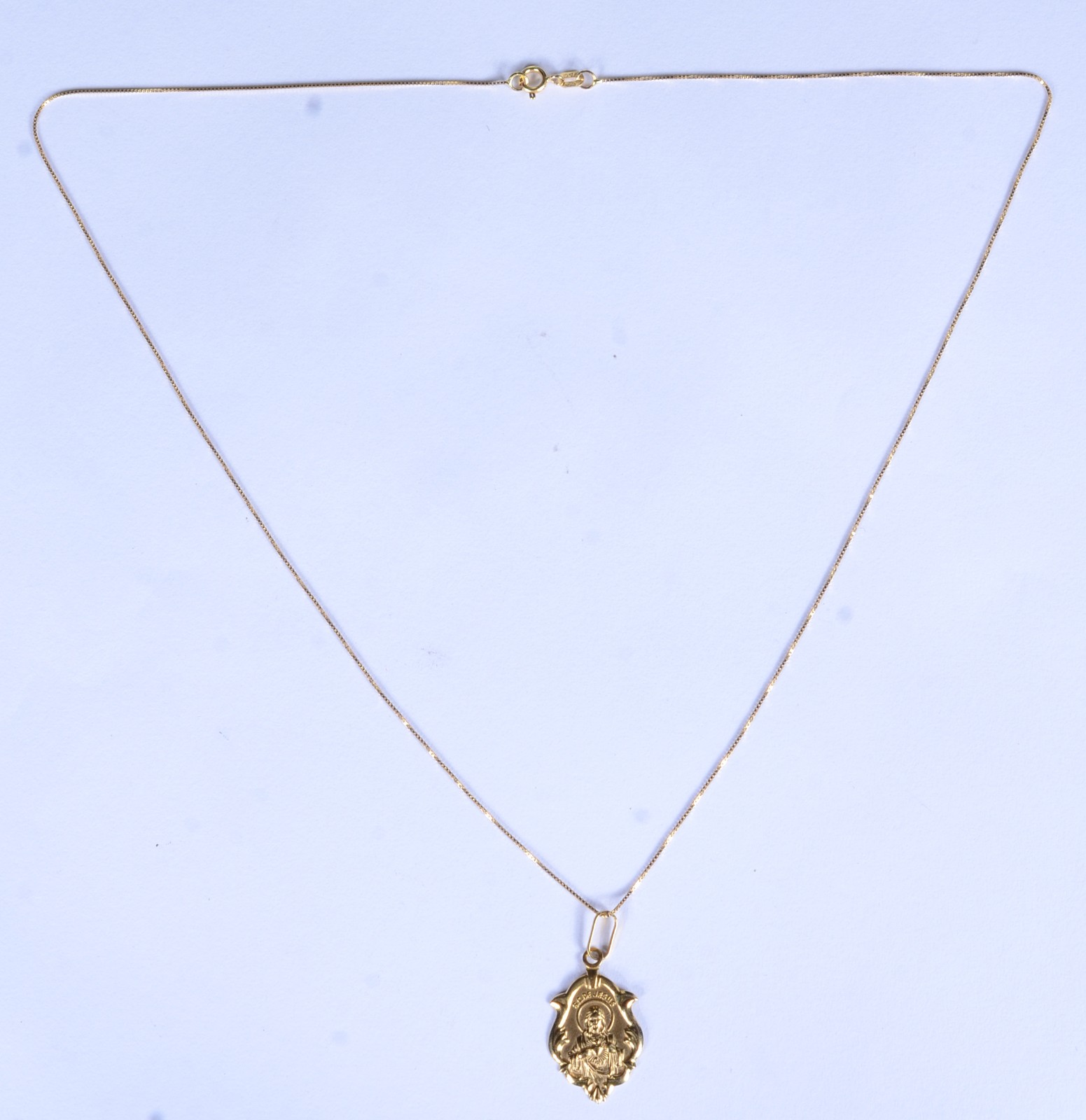 Colar de ouro 18 k., contraste 750 com pendente Sacro. (Por motivos... - foto 2 de 7